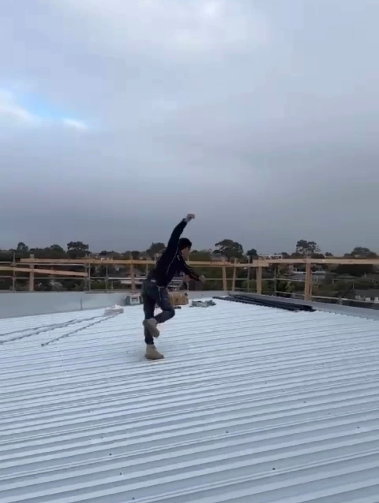 Ampix Electrical team member working on a rooftop